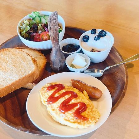 Guesthouse ＆ Beach Cafe Fuego Hyuga Екстериор снимка