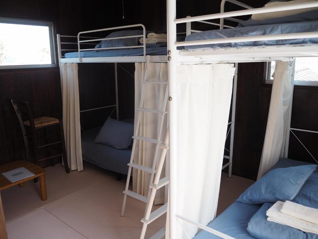 Guesthouse ＆ Beach Cafe Fuego Hyuga Стая снимка