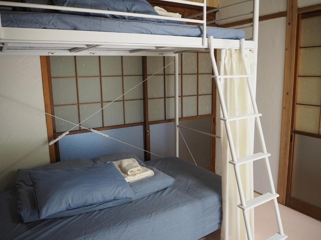 Guesthouse ＆ Beach Cafe Fuego Hyuga Стая снимка