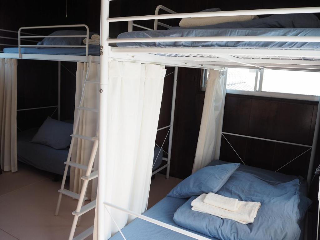 Guesthouse ＆ Beach Cafe Fuego Hyuga Стая снимка