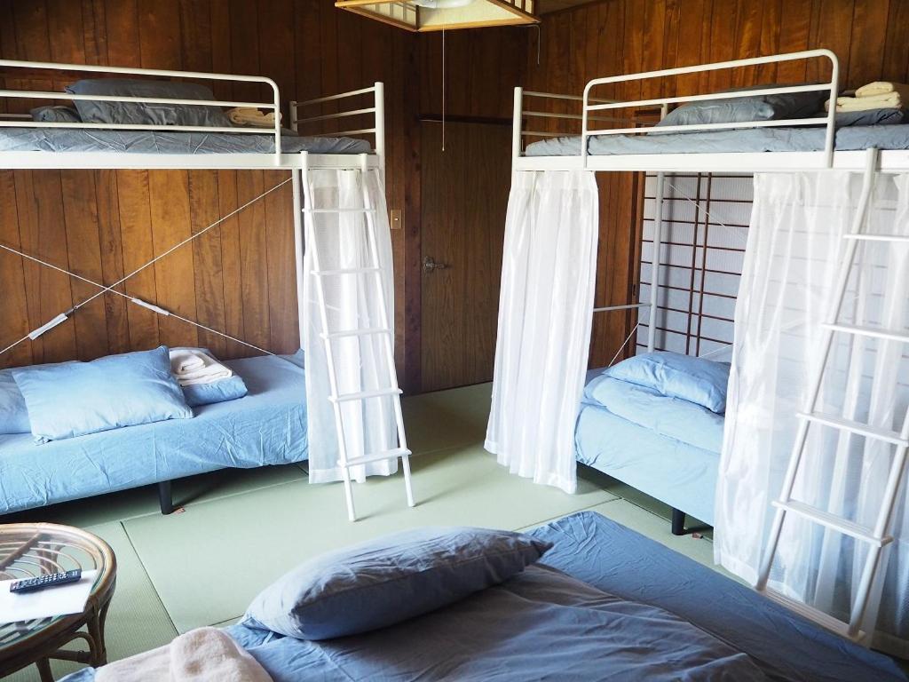 Guesthouse ＆ Beach Cafe Fuego Hyuga Стая снимка